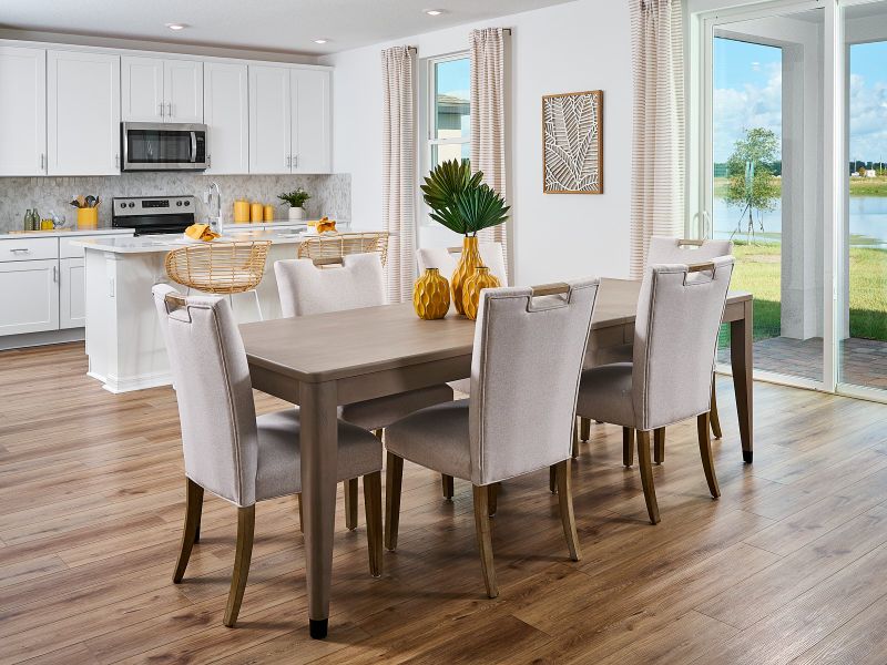 Dining room in the Primrose plan modeled at The Meadow at Crossprairie