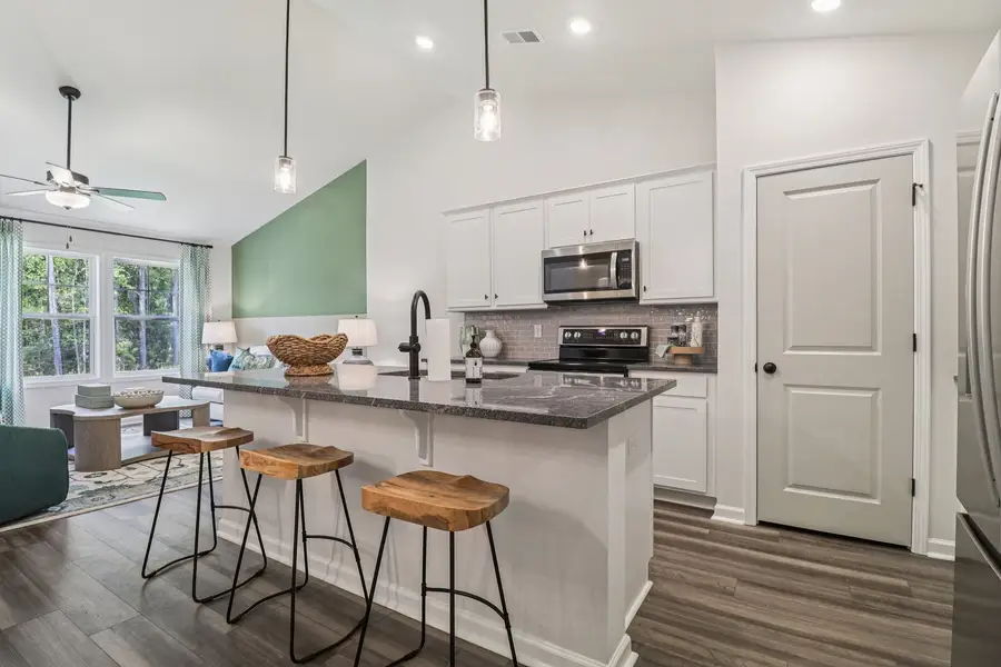 Cook, dine, and connect in this open-concept kitchen