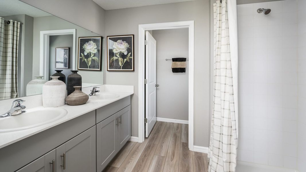 Furnished interior in a model home at Bellehaven in Belleview (Image 8).