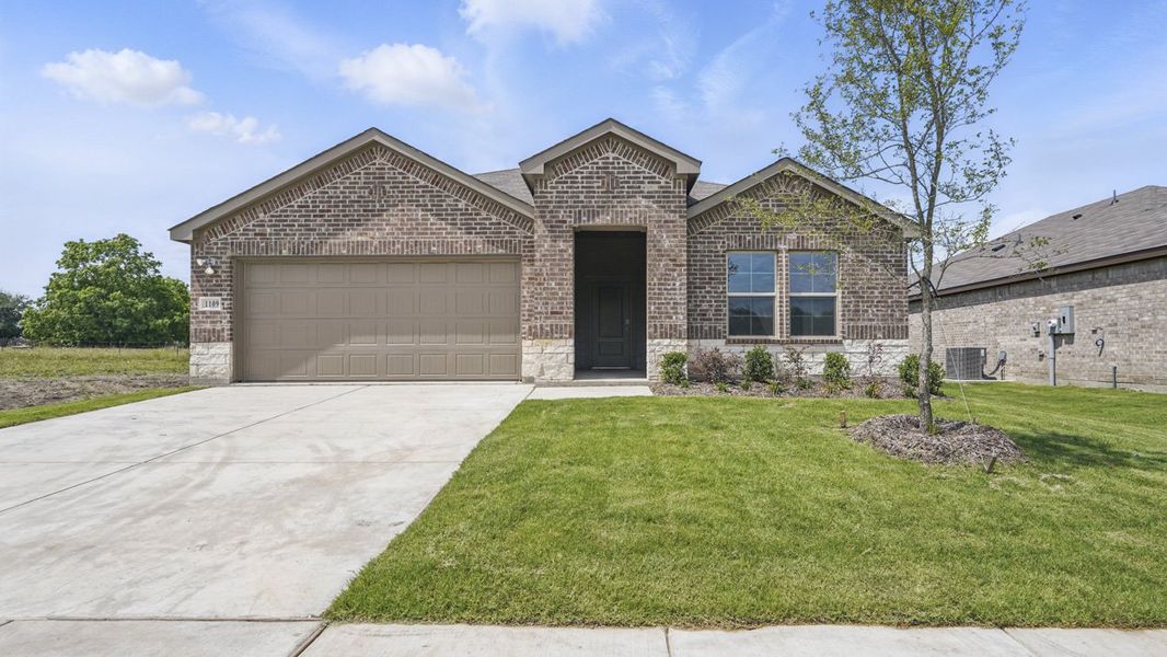 Front exterior of a home in the Sanger Circle community, located in Sanger, TX (Image 1).