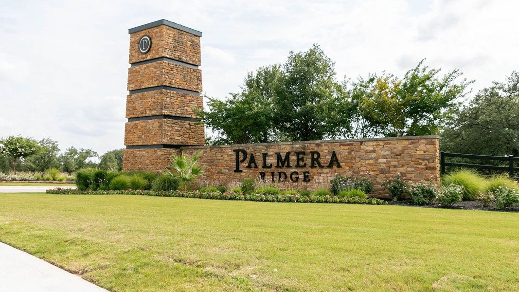 Entrance to the Palmera Ridge: 80ft. lots community in Leander, TX, featuring signage and landscaping (Image 41). Entrance to the Palmera Ridge: 80ft. lots community in Leander, TX, featuring signage and landscaping (Image 41).