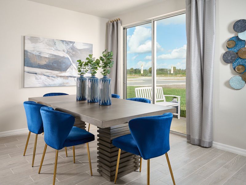 Dining Area of the Hibiscus plan modeled at Summerwoods.