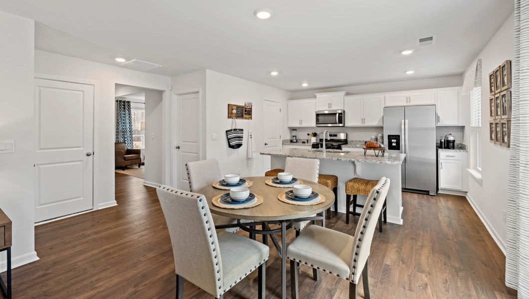 Furnished interior in a model home at Bentley Park in Greenwood (Image 16).