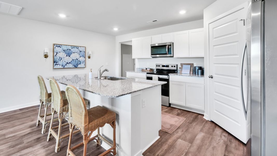 Furnished interior in a model home at Driftwood in Richlands (Image 6).