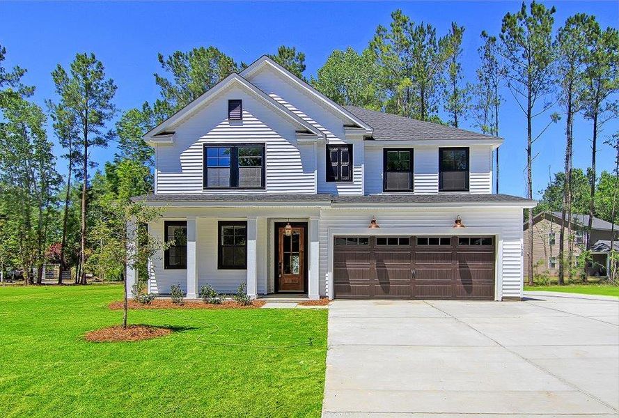 Front exterior of a home in the Huckleberry Estates community, located in Conway, SC (Image 8). Front exterior of a home in the Huckleberry Estates community, located in Conway, SC (Image 8).