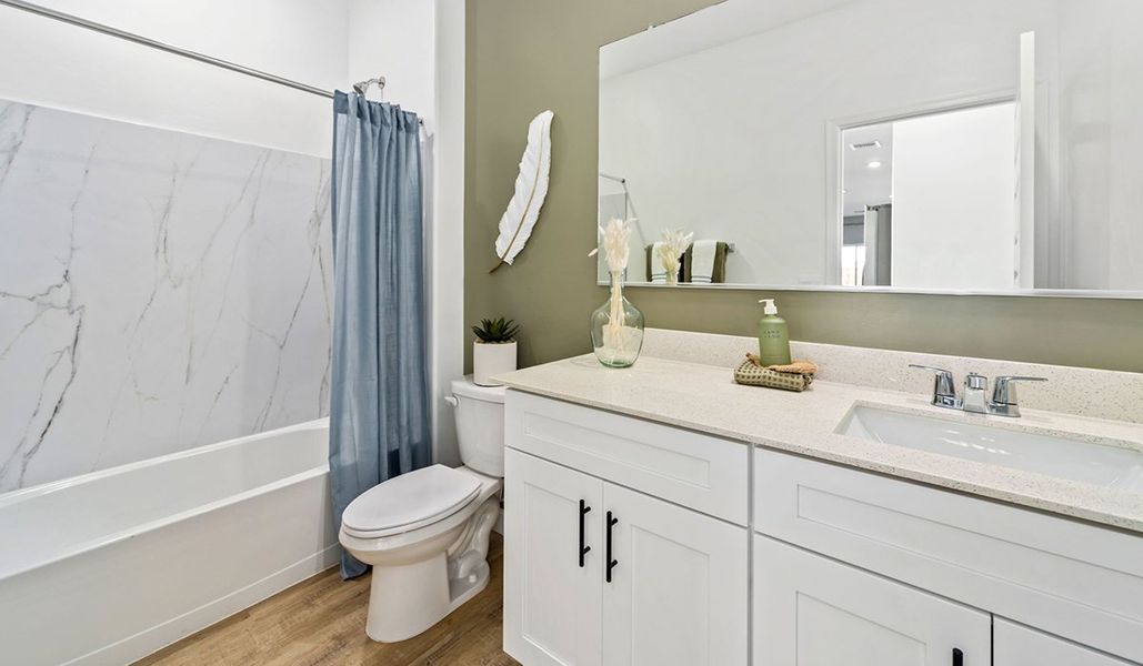 Furnished interior in a model home at Redford Estates in Tucson (Image 24).