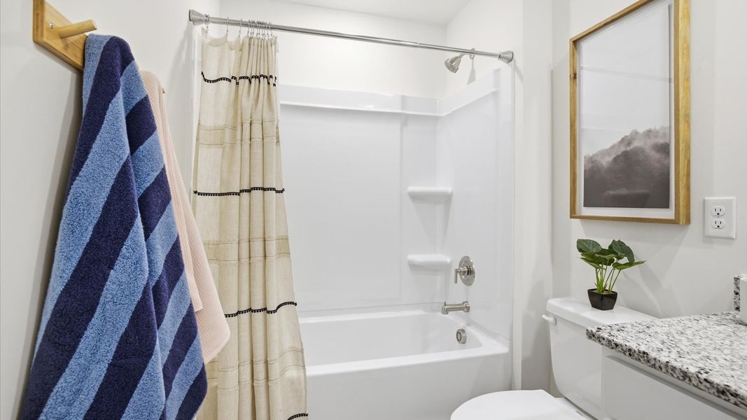 Furnished interior in a model home at Price's Point in Knoxville (Image 37).