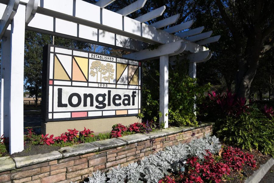 Main entrance to the Longleaf master-planned community in New Port Richey, FL, featuring its landmark signage (Image 1). Main entrance to the Longleaf master-planned community in New Port Richey, FL, featuring its landmark signage (Image 1).
