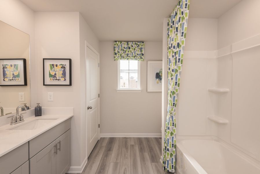 You won't run out of space in this full bathroom featuring a convenient closet space.