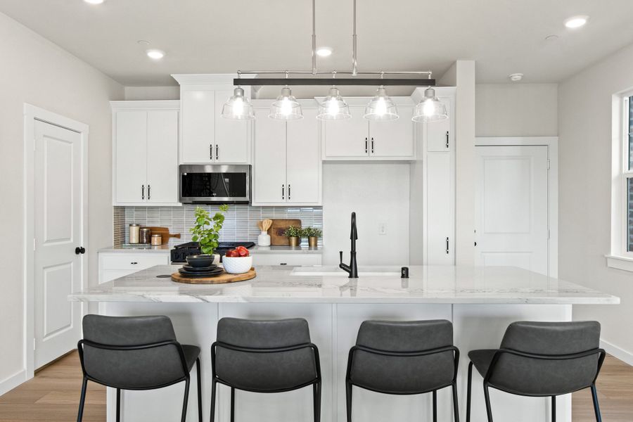 Furnished interior in a model home at Woodbridge Townhomes in Wylie (Image 11).