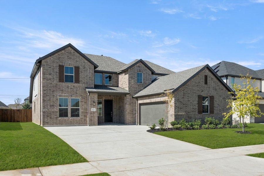 Front exterior of a home in the View at the Reserve 60s community, located in Mansfield, TX (Image 10).
