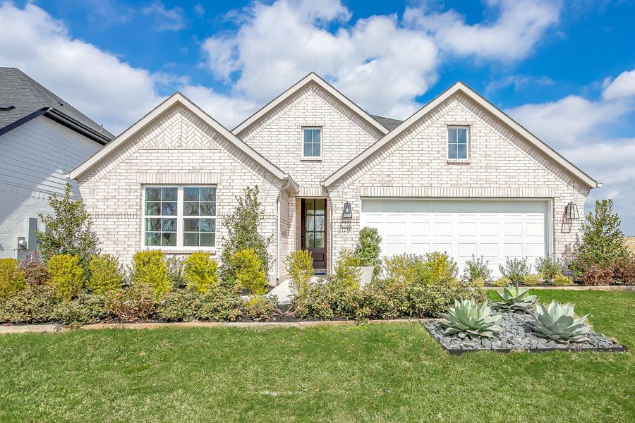 Front exterior of a home in the Creekside community, located in Royse City, TX (Image 18).