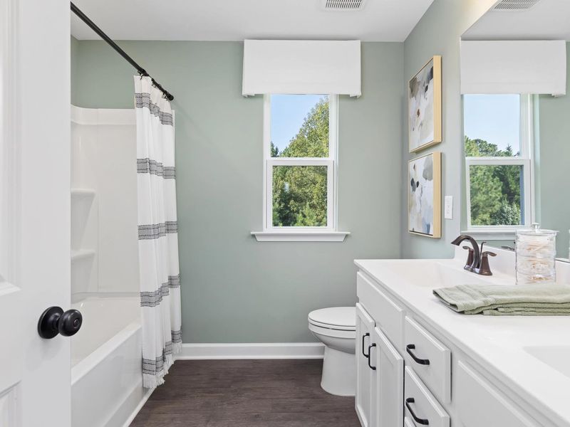 Furnished interior in a model home at Woodland Crossing in Zebulon (Image 33). Furnished interior in a model home at Woodland Crossing in Zebulon (Image 33).