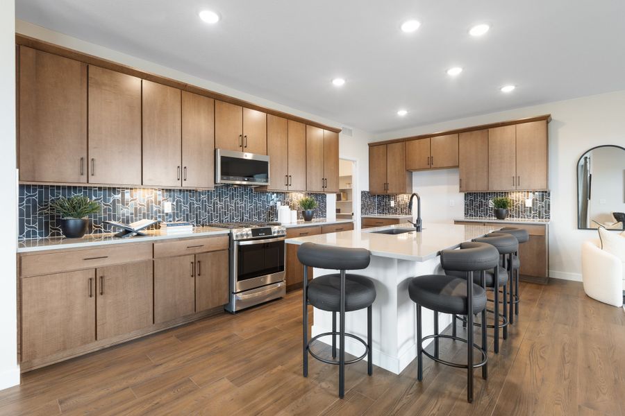 Furnished interior in a model home at Cordovan in Firestone (Image 4).