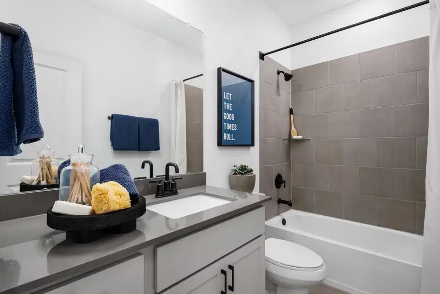 Furnished interior in a model home at Raburn Reserve in Tomball (Image 11).