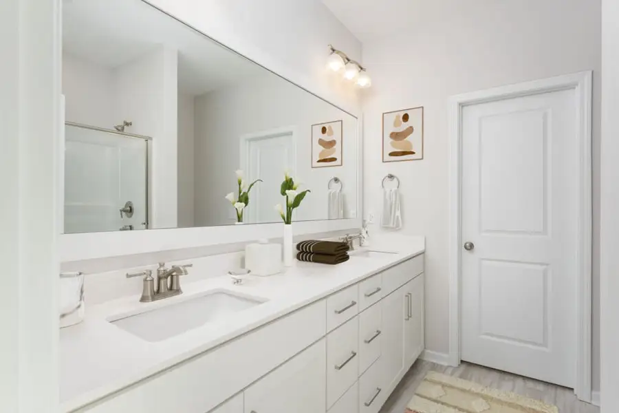 Furnished interior in a model home at River Hills in Shallotte (Image 5).