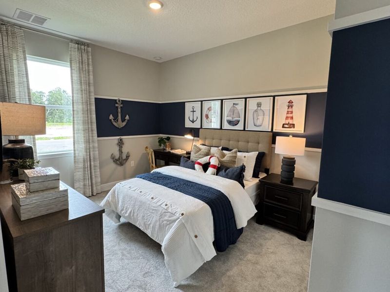 Furnished interior in a model home at Huntington Park in Titusville (Image 25). Furnished interior in a model home at Huntington Park in Titusville (Image 25).