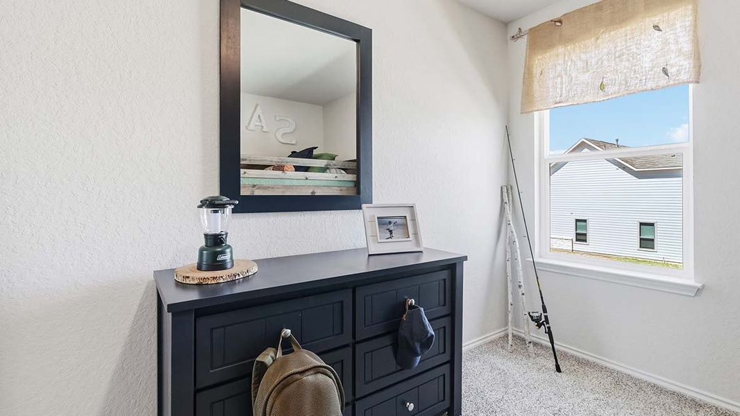 Furnished interior in a model home at Blue Ridge Ranch in San Antonio (Image 42).