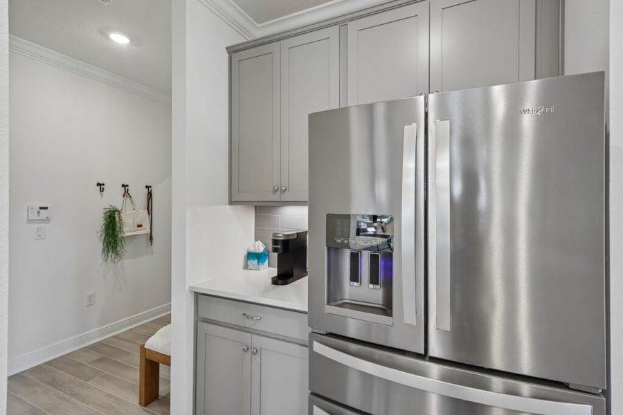 Furnished interior in a model home at Mahogany At Jubilee in Pace (Image 22).