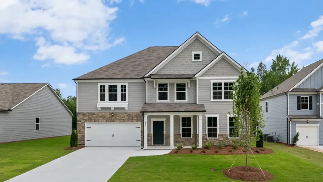 Front exterior of a home in the Enclave at Stonewall Tell community, located in South Fulton, GA (Image 2).