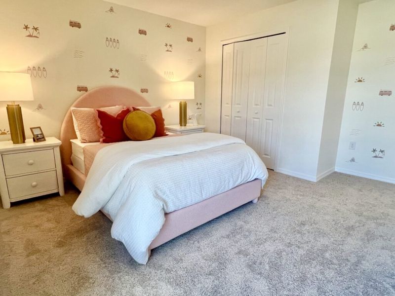 Furnished interior in a model home at Richmond Cove in Palm Bay (Image 37).