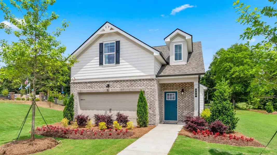 Front exterior of a home in the Abbotts Crossing community, located in Conyers, GA (Image 2).
