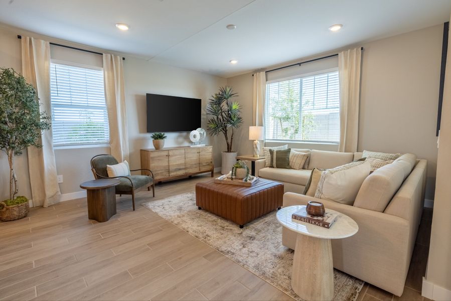 Furnished interior in a model home at Blossom Rock Reserve Series in Apache Junction (Image 19).
