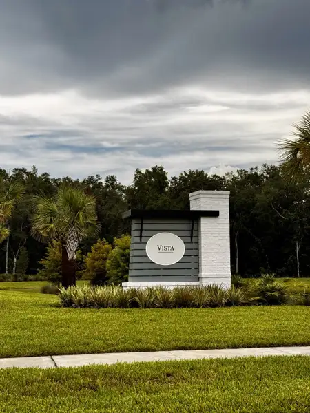 A welcoming entrance sign with lush landscaping in RiverTown - Vista by Mattamy Homes (St. Johns, FL). A welcoming entrance sign with lush landscaping in RiverTown - Vista by Mattamy Homes (St. Johns, FL).