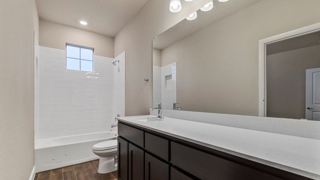 Furnished interior in a model home at Eden Ranch in Arlington (Image 30).