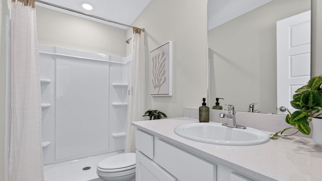 Furnished interior in a model home at Liberty Cove in Yulee (Image 8).