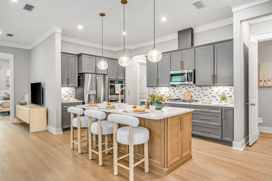 Furnished interior in a model home at The Villas at Longleaf Park, a Watersound Origins® community in Inlet Beach (Image 8).