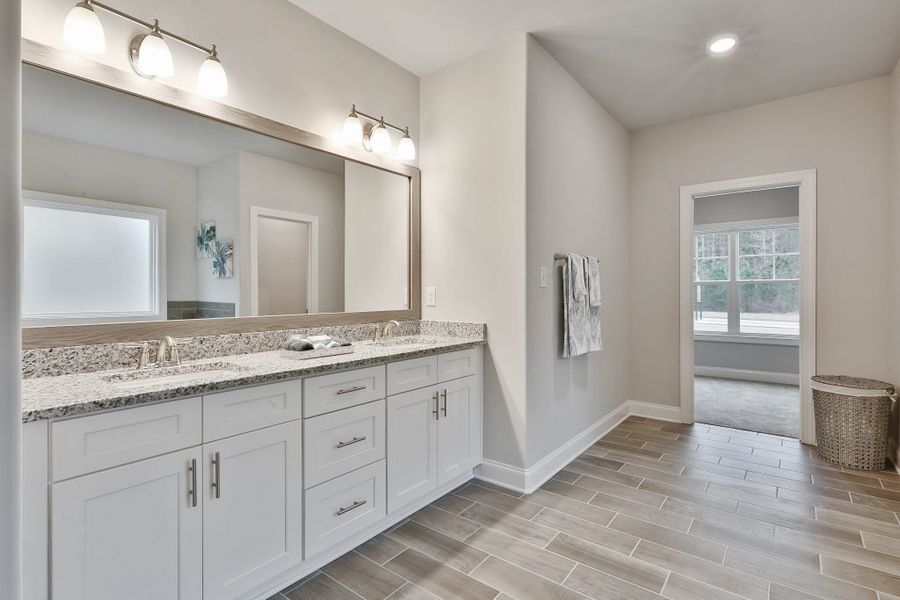 Furnished interior in a model home at Estates at Dorsett Bridge in Douglasville (Image 16).