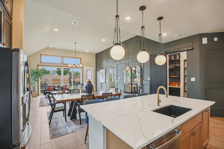 Furnished interior in a model home at Meridiana 50's in Manvel (Image 29).