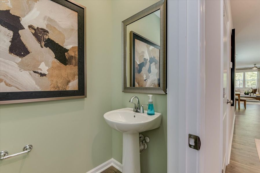 A main-level half bath offers added convenience for daily living A main-level half bath offers added convenience for daily living