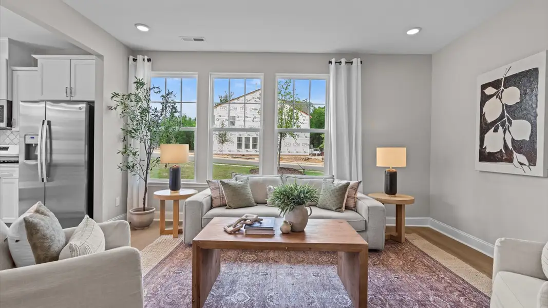 Furnished interior in a model home at Essex Townes in Franklinton (Image 4).
