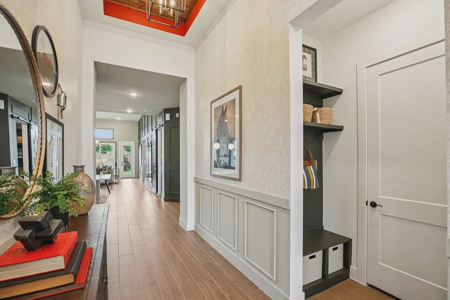 Furnished interior in a model home at Meridiana 50's in Manvel (Image 20).