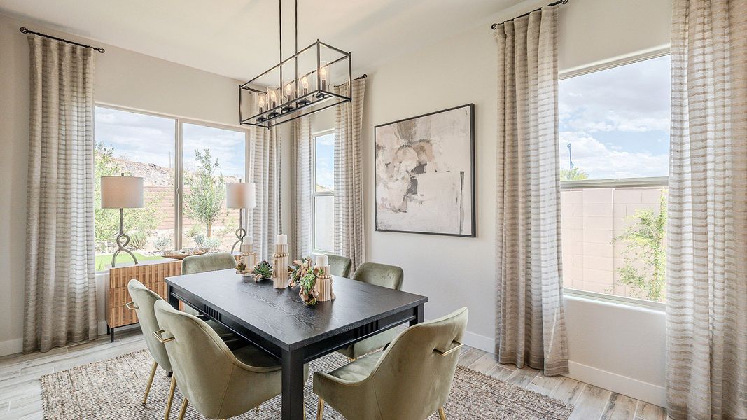 Experience elegance with large windows, a designer chandelier, and sophisticated finishes in Estrella.