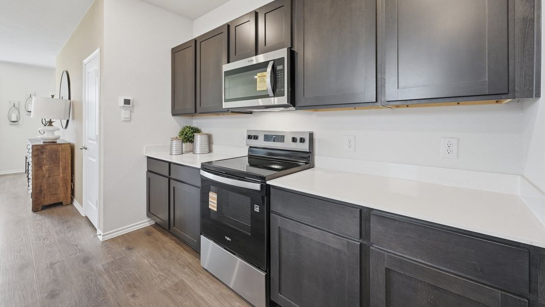 Furnished interior in a model home at Arbor Trails South in Princeton (Image 63).