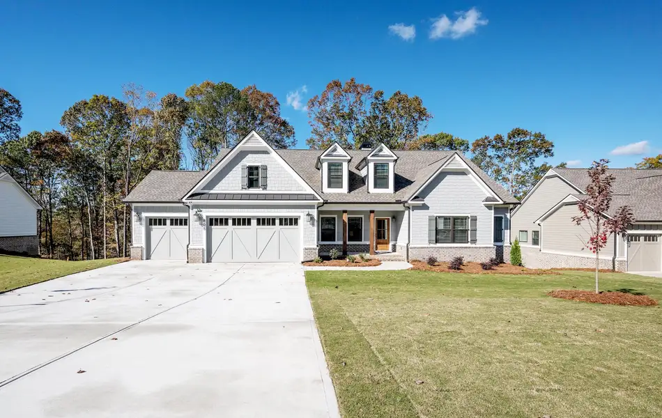 Front exterior of a home in the Spring Creek community, located in Monroe, GA (Image 9).