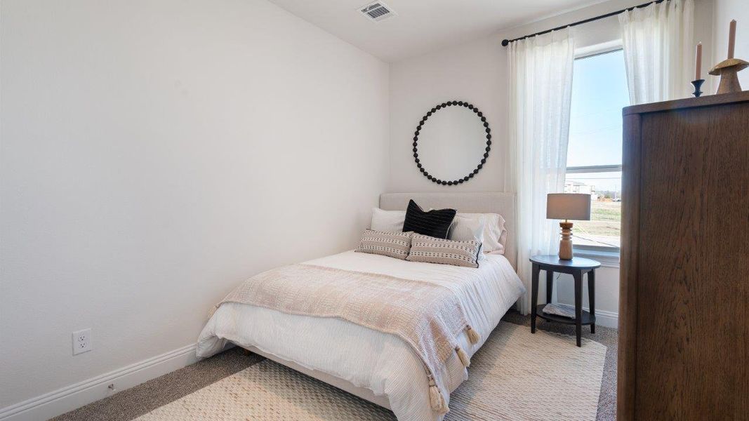 Furnished interior in a model home at Waterbend in Euless (Image 13).