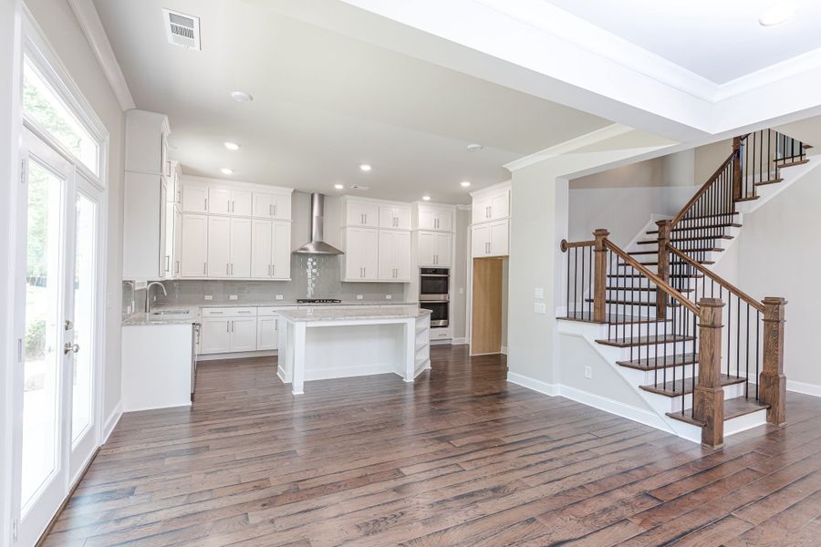 Furnished interior in a model home at Waterhaven in Cumming (Image 39).
