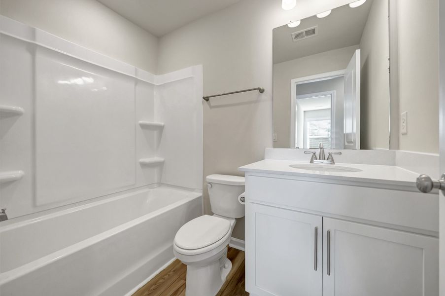 Furnished interior in a model home at Percival Village in Columbia (Image 26).