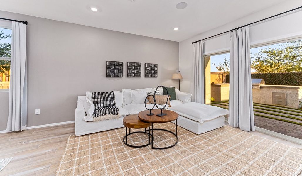 Furnished interior in a model home at Coronet at Gladden Farms in Marana (Image 54).
