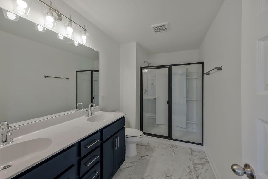 Furnished interior in a model home at Oxford Station in Gallatin (Image 52).