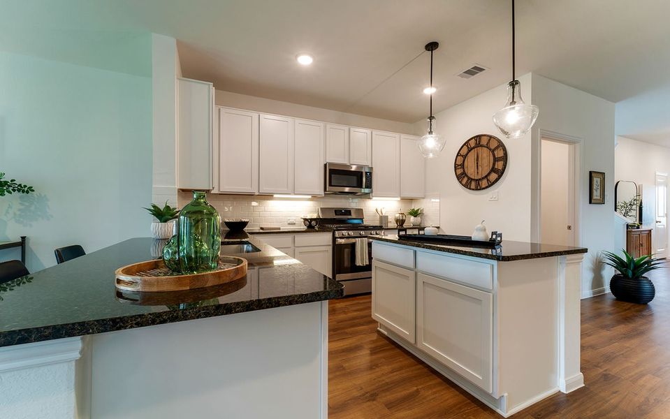 Furnished interior in a model home at The Pines at Seven Coves in Willis (Image 17).