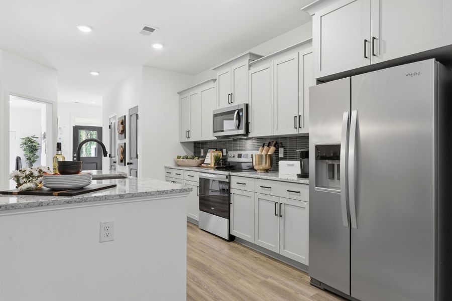 Furnished interior in a model home at The Knoll at White Oak in Garner (Image 5).