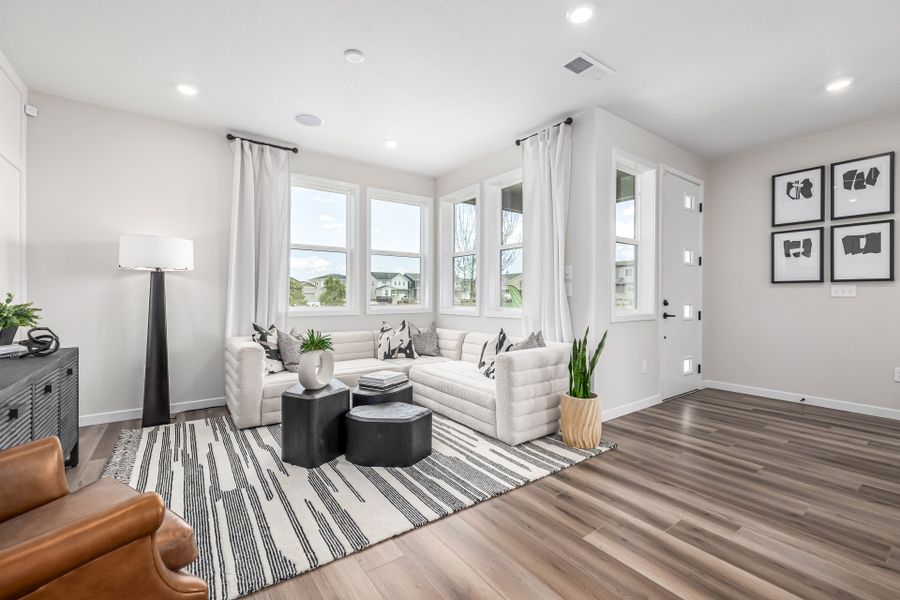 Furnished interior in a model home at Painted Prairie in Aurora (Image 5).