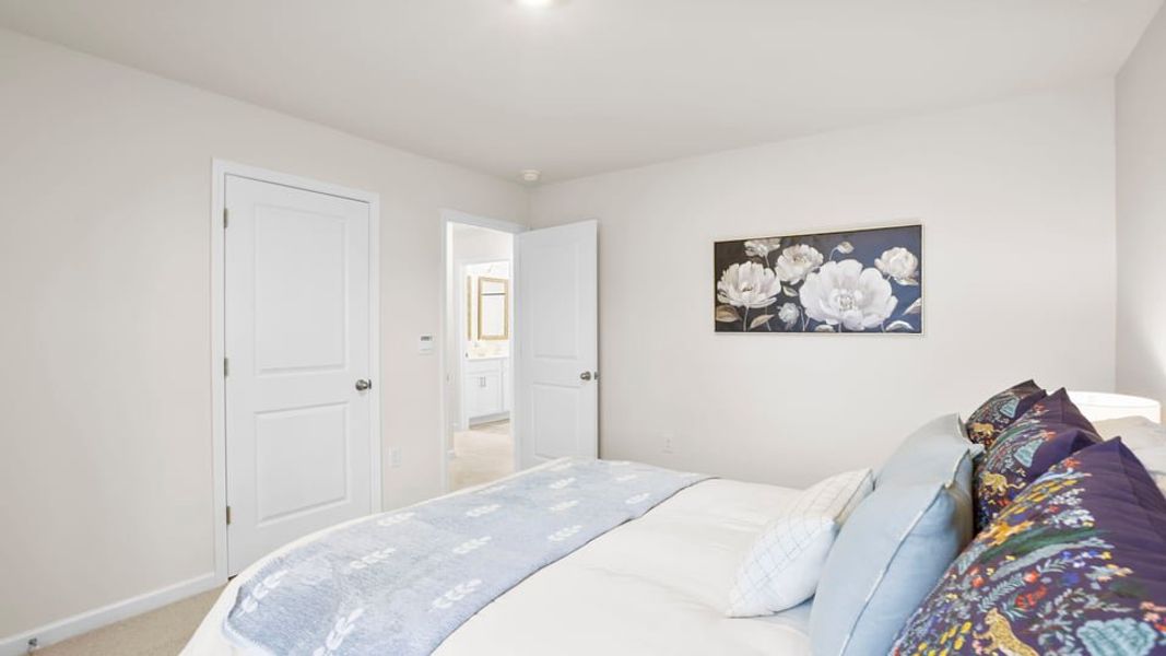 Furnished interior in a model home at Benjamin's Grove in Woodruff (Image 33).