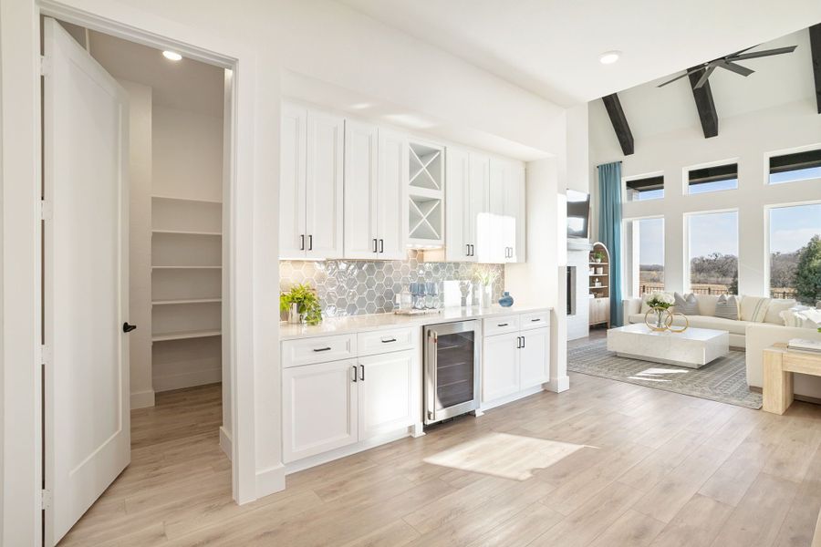 Furnished interior in a model home at Lily Creek at Sutton Fields in Aubrey (Image 64).