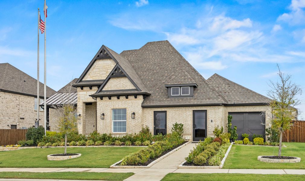 Front exterior of a home in the Lovers Landing community, located in Forney, TX (Image 2).